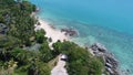 Aerial top view of sea coastline and island with palm trees Royalty Free Stock Photo