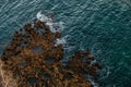 Aerial top view of sea waves against the sea Royalty Free Stock Photo