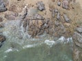 Aerial top view of sea waves and fantastic Rocky coast,