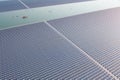 Aerial top view of solar panels or solar cells on buoy floating in lake sea or ocean. Power plant with water, renewable energy Royalty Free Stock Photo