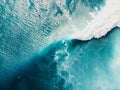 Aerial top view of surfing at barrel waves. Blue waves and surfers Royalty Free Stock Photo