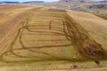 Aerial top view of tractor traces in plowed field Royalty Free Stock Photo