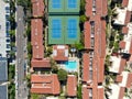 Aerial top view of typical south california community condo with tennis court and pool Royalty Free Stock Photo