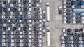 Aerial top view of white cargo trailer parking, trailer line up