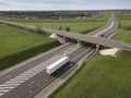 Aerial Top View of White Truck with Cargo Semi Trailer Moving on Royalty Free Stock Photo