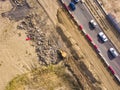 Aerial top view of yellow bulldozer work dig soil f Royalty Free Stock Photo