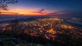 Aerial townscape top down view at sunset with skyline and street lights