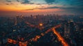Aerial townscape top down view at sunset with skyline and street lights Royalty Free Stock Photo