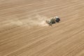 Aerial Tractor sowing crops at field