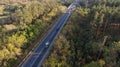Aerial. Traffic motion on a country highway.