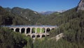 Aerial of train on viaduct in Semmering railway, Austria