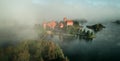 Aerial Trakai castle in misty sunrise