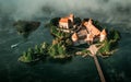 Aerial Trakai castle in misty sunrise