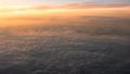 Aerial traveling. Flying at dusk or dawn. Fly through orange cloud and sun