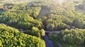 Aerial. Truck with a tank ride on the road outside the city. Royalty Free Stock Photo