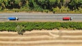 Aerial. Trucks on a highway road. Transport logistics background. Top view Royalty Free Stock Photo