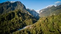 Aerial of Ventisquero Colgante, a hanging Glacier with waterfall and lake in queulat national park.