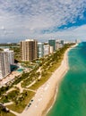 Aerial vertical panorama Miami Beach Bal Harbour FL USA beachfront real estate condominium apartments