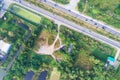 Aerial vew of rural road with car and gree tree into th west reg Royalty Free Stock Photo