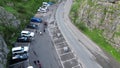 Aerial video of people and cars on the road, Chedder Gorge in England