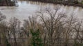 Aerial view from of Aare river with high level water because of melting brown snow water in winter time Royalty Free Stock Photo