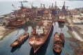 aerial view of abandoned dockyard with rusty cranes and ships