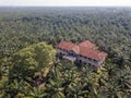 Aerial view abandoned 99 doors mansion in evening.