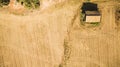 Aerial view of abandoned house in the middle of a field Royalty Free Stock Photo