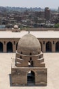 Aerial view of ablution fountain of Ibn Tulun historical mosque with grunge houses in the background, Cairo, Egypt Royalty Free Stock Photo