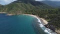 Aerial view above Cepe Beach bay - Aragua State, Venezuela, backward drone
