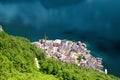 Aerial view from above on famous historical Hallstatt town on Hallstatter lake in austrian Alps. Scenic travel destination Royalty Free Stock Photo