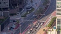 Aerial view from above to a busy road intersection in Dubai timelapse.