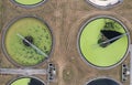 Aerial view above waste water treatment plant with green algae Royalty Free Stock Photo