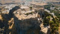 Aerial view of the Acropolis of Lindos on the Rhodes island at daytime in Greece Royalty Free Stock Photo