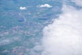 Aerial view of agricultural fields, river, mountains, and land have seen through the airplane window Royalty Free Stock Photo