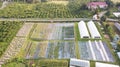 Aerial view of Agricultural plots, Allotment plot in Spring, prepared for planting. An allotment is a plot of land rented and use