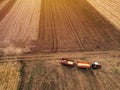 Aerial view of agricultural tractor in the field Royalty Free Stock Photo