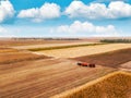 Aerial view of agricultural tractor in the field Royalty Free Stock Photo