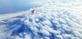 Aerial view of Aircraft or Airplane wing flying on sky and beautiful white clouds Royalty Free Stock Photo