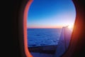 Aerial view from airplane window at sunrise Royalty Free Stock Photo