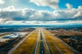 Aerial View: Airport Runway in Sunlight. Royalty Free Stock Photo