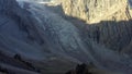 Aerial view of the Aksai Glacier and the snow-capped mountain peaks of the Ala-Archa National Park in Kyrgyzstan