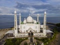 Aerial view of Al-Hakim Mosque. is a Taj Mahal-style mosque on the shores of Padang Beach, Padang City, West Sumatra, Indonesia. Royalty Free Stock Photo