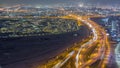Aerial view of Al Khail road busy traffic near business bay district night timelapse Royalty Free Stock Photo