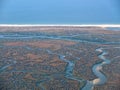 Aerial view of the beautiful Algarve coast, Parque natural Ria Formosa, in Portugal seen on a flight to Faro Royalty Free Stock Photo