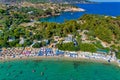 Aerial View of the Aliki Beach with colorful umbrellas, at Thassos island, Greece Royalty Free Stock Photo