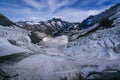 Aerial view of the Alps mountains in Switzerland. View from helicopter in Swiss Alps. Mountain tops in snow. Royalty Free Stock Photo