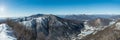 Snow capped Alps mountain range, Italy. In the foreground the Valganna Royalty Free Stock Photo