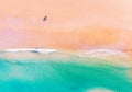 Aerial view of amazing beach with honeymoon couple walking on beach in morning light close to turquoise sea,Top view of summer Royalty Free Stock Photo