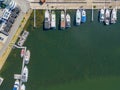 Aerial view of amazing boats. Minimalistic landscape with boats in a bay. Top view from drone of harbor or port with Royalty Free Stock Photo